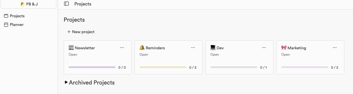 The Projects view: a New project button above four project cards, each showing its status and task progress, with Archived Projects below